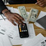 hand of a person using a calculator