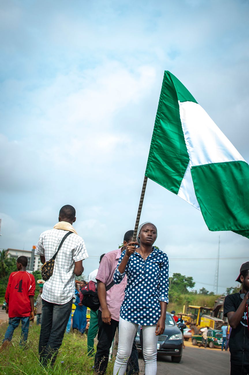 woman with flag on street protest