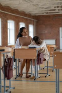 women sitting on chairs
