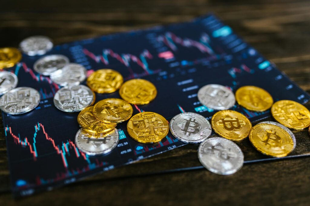 close up shot of bitcoins on wooden surface