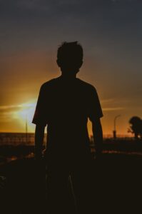 silhouette of a person during sunset
