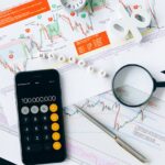 black smartphone on white paper