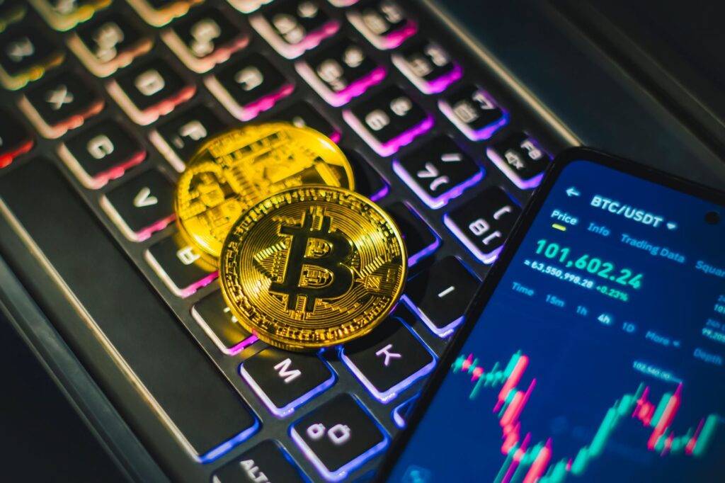 bitcoin cryptocurrency on illuminated keyboard