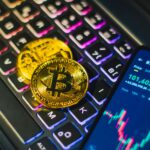 bitcoin cryptocurrency on illuminated keyboard