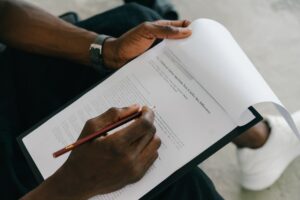 close up of man looking at a document with an autism test