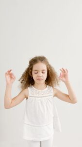 a girl in yoga pose