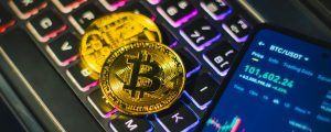 bitcoin cryptocurrency on illuminated keyboard