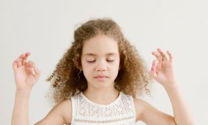 a girl in yoga pose